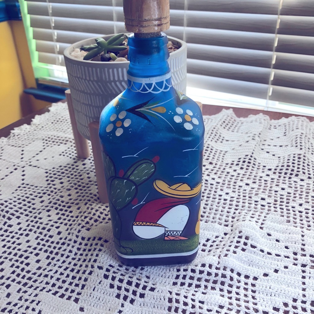 Hand painted tequila bottle.